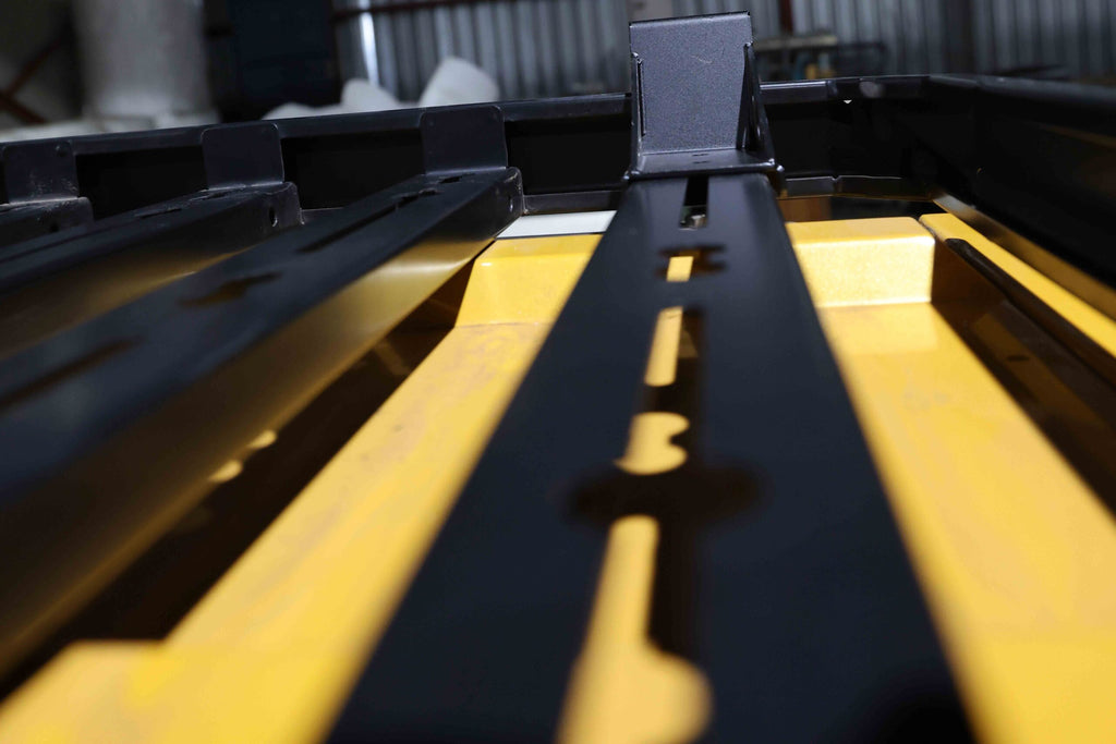 CanoPeak roof rack rail detail; illustrative installed example