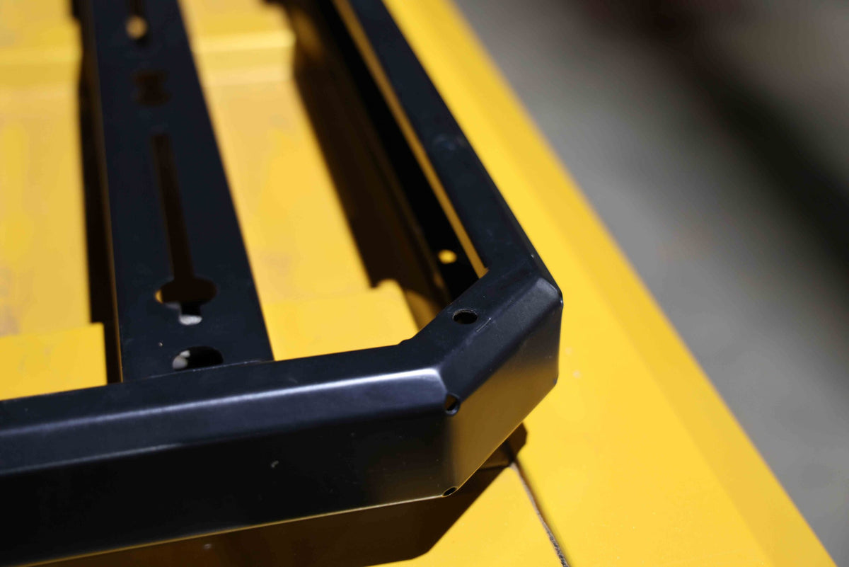 CanoPeak roof rack corner and mounting detail; illustrative installed example
