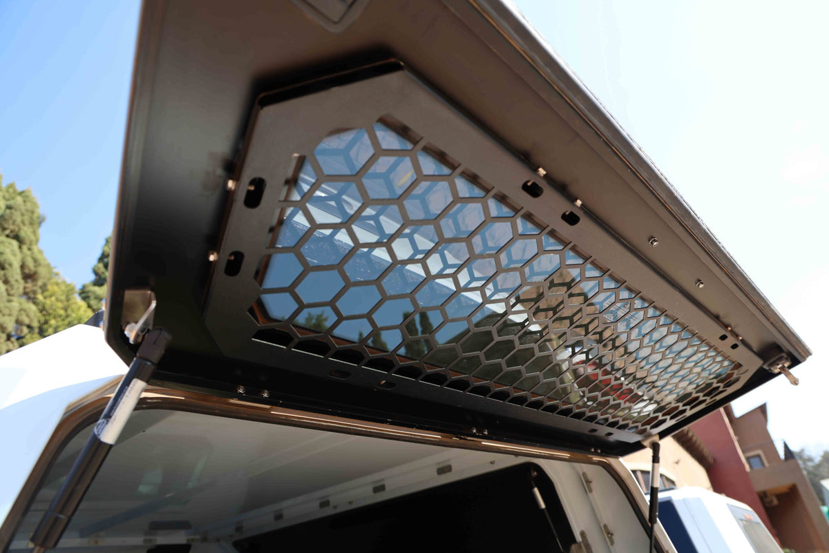 CanoPeak rear-window security screen installed inside the raised rear canopy door