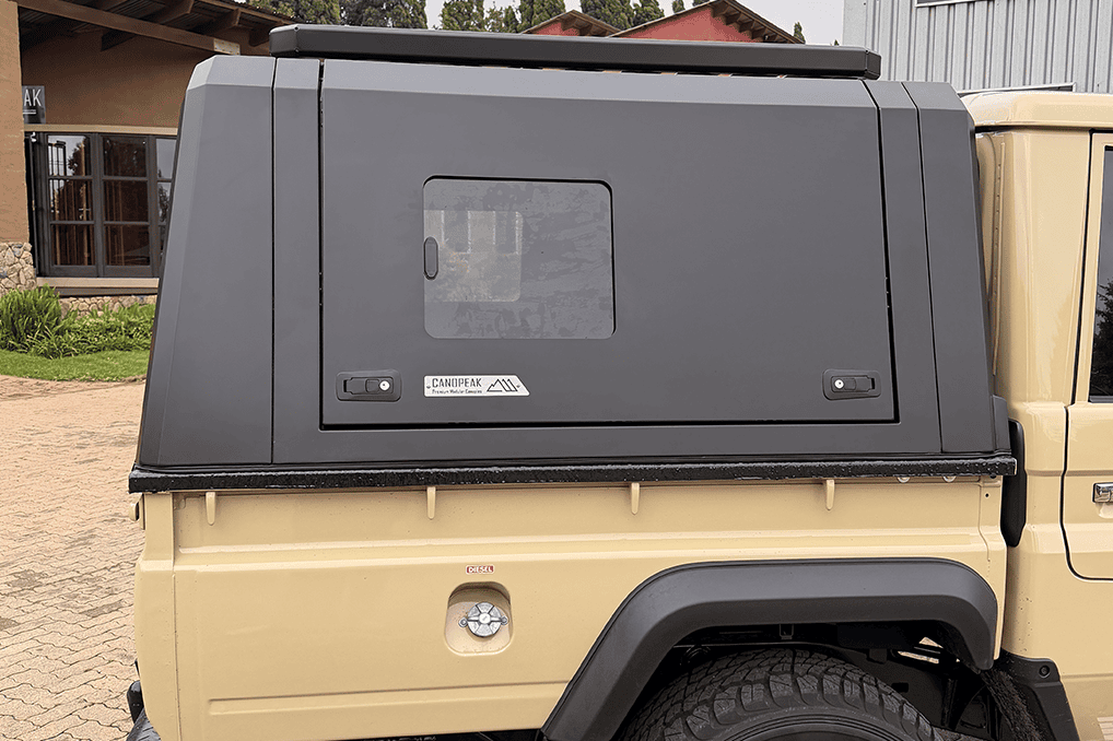 CanoPeak side window fitted to a Toyota canopy; illustrative installed example