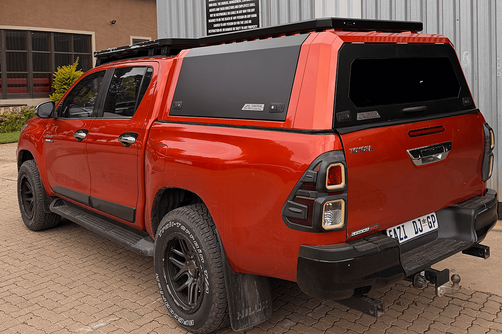 Colour-matched CanoPeak canopy fitted to a Toyota Hilux double cab; illustrative installed example